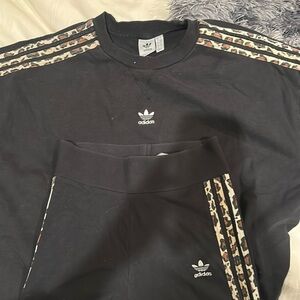 Adidas sweatshirt and leggings set.